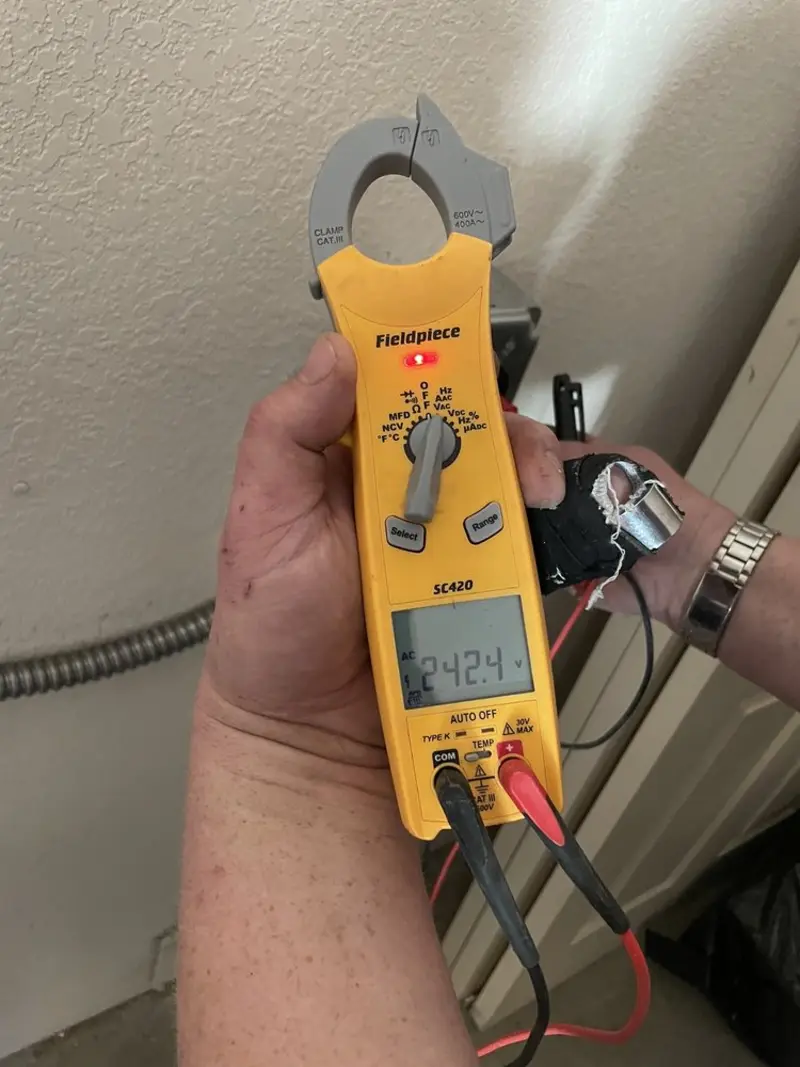 Voltage testing with clamp meter during Aluminum Wiring Replacement in Mason City